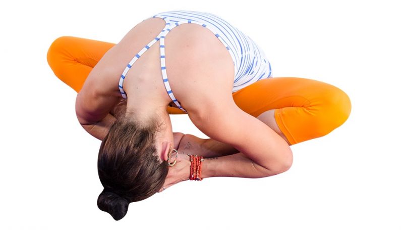 Yoga for Back Pain: Restore Ease in Mind and Body with Supported Bridge Pose  - YogaUOnline